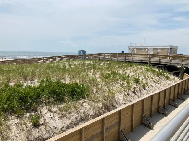 a view of swimming pool with a outdoor seating
