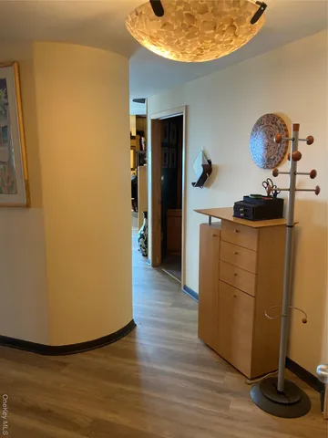a view of kitchen island with wooden floor