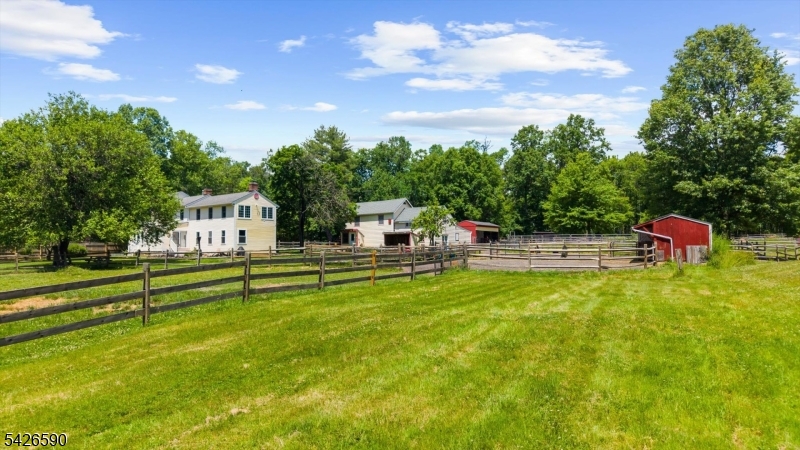 179 Lindbergh Road Hopewell, NJ 08525 - Photo 36 of 46 a front view of a house with a garden and entertaining space