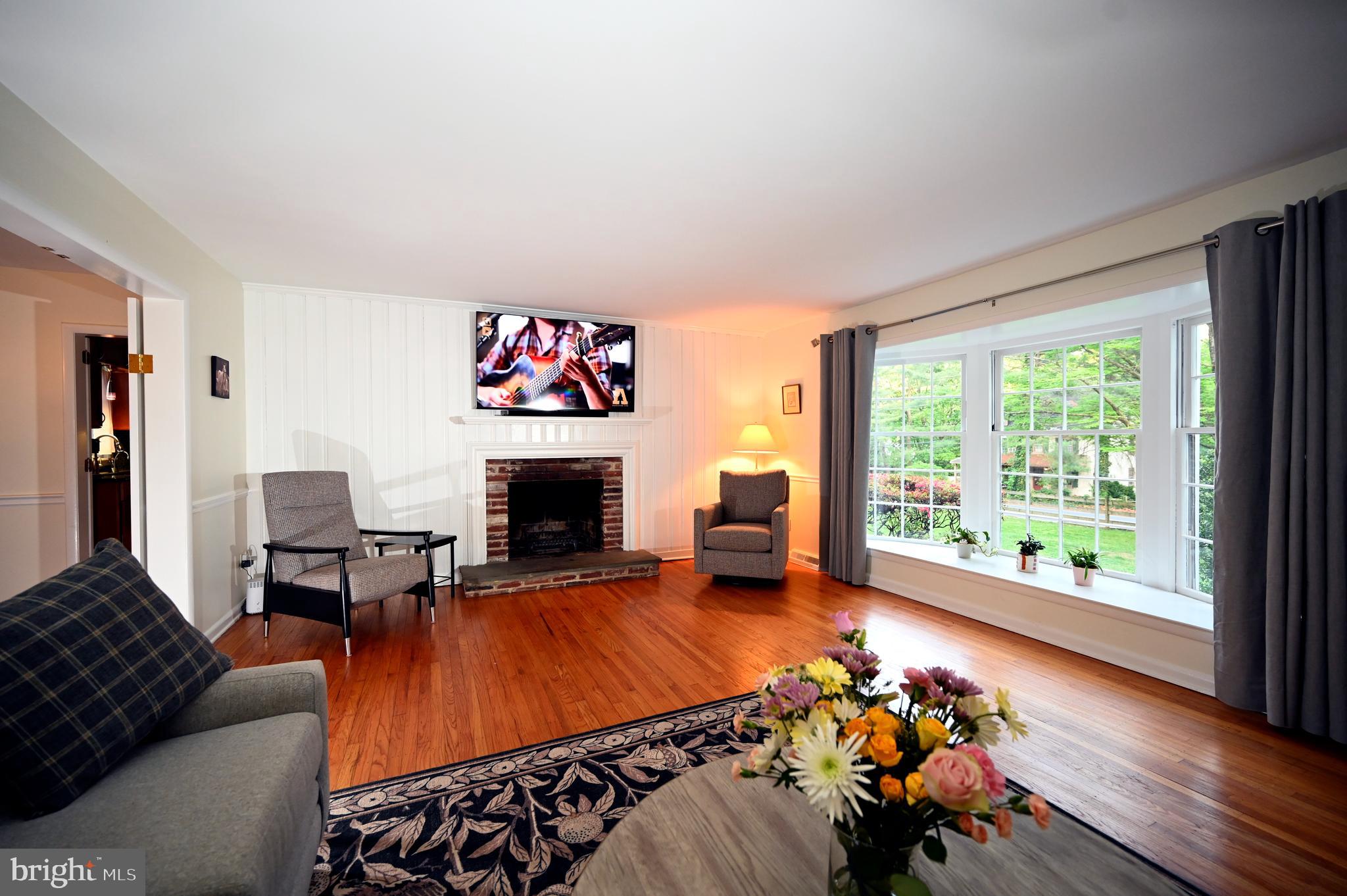 572 Cricket Lane Wayne, PA 19087 - Photo 13 of 37 a living room with furniture and a fireplace