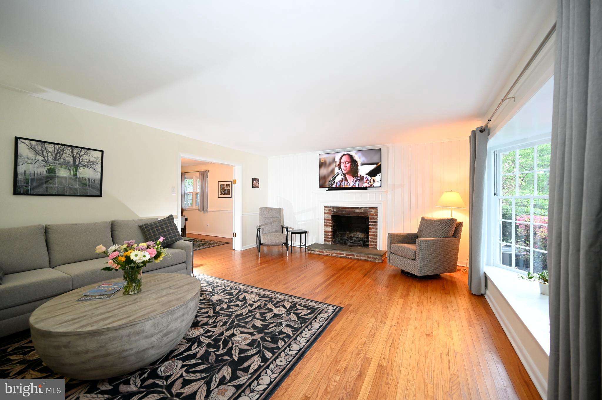 572 Cricket Lane Wayne, PA 19087 - Photo 14 of 37 a living room with furniture and a fireplace
