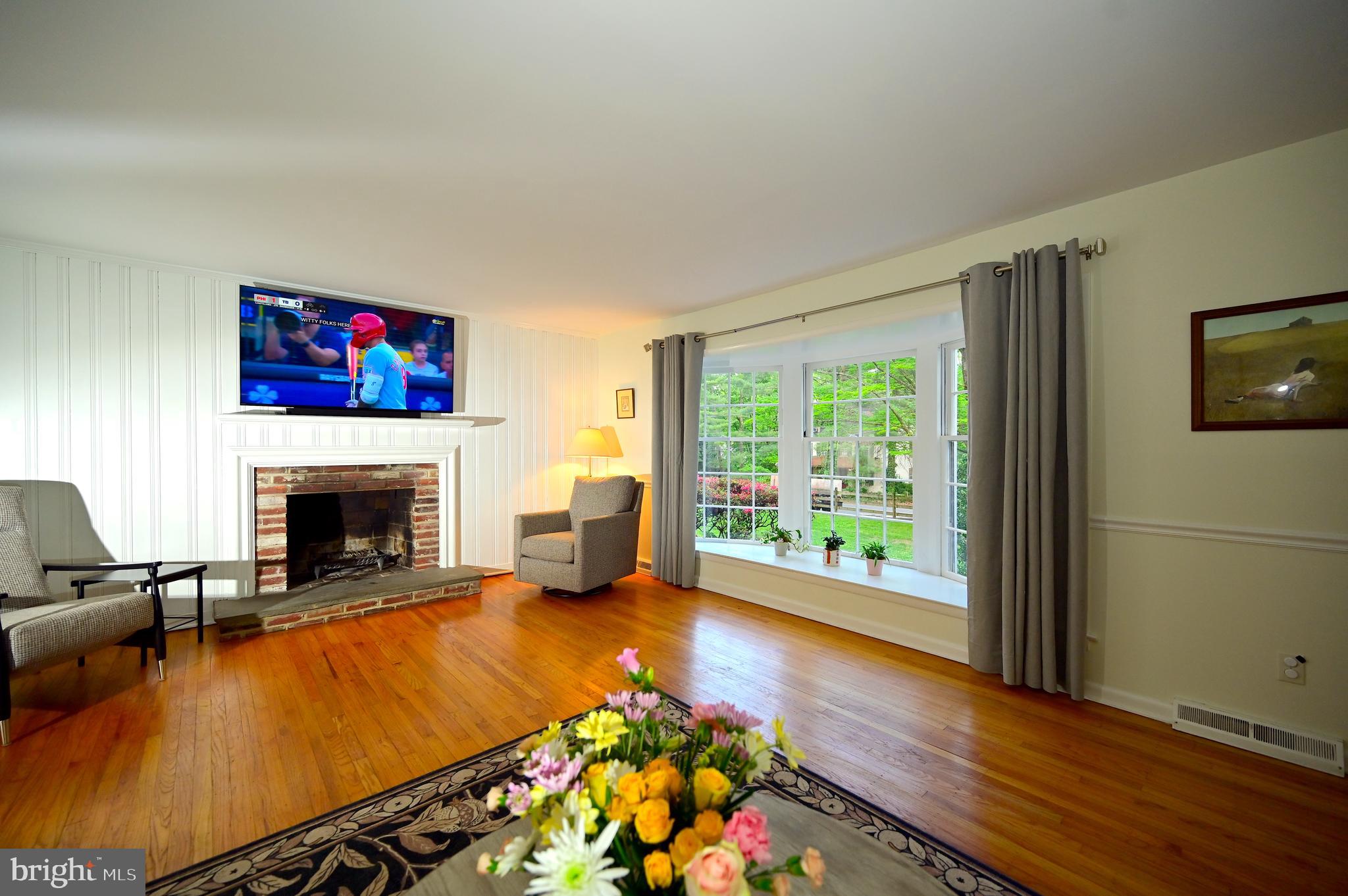 572 Cricket Lane Wayne, PA 19087 - Photo 15 of 37 a living room with furniture fireplace and flat screen tv