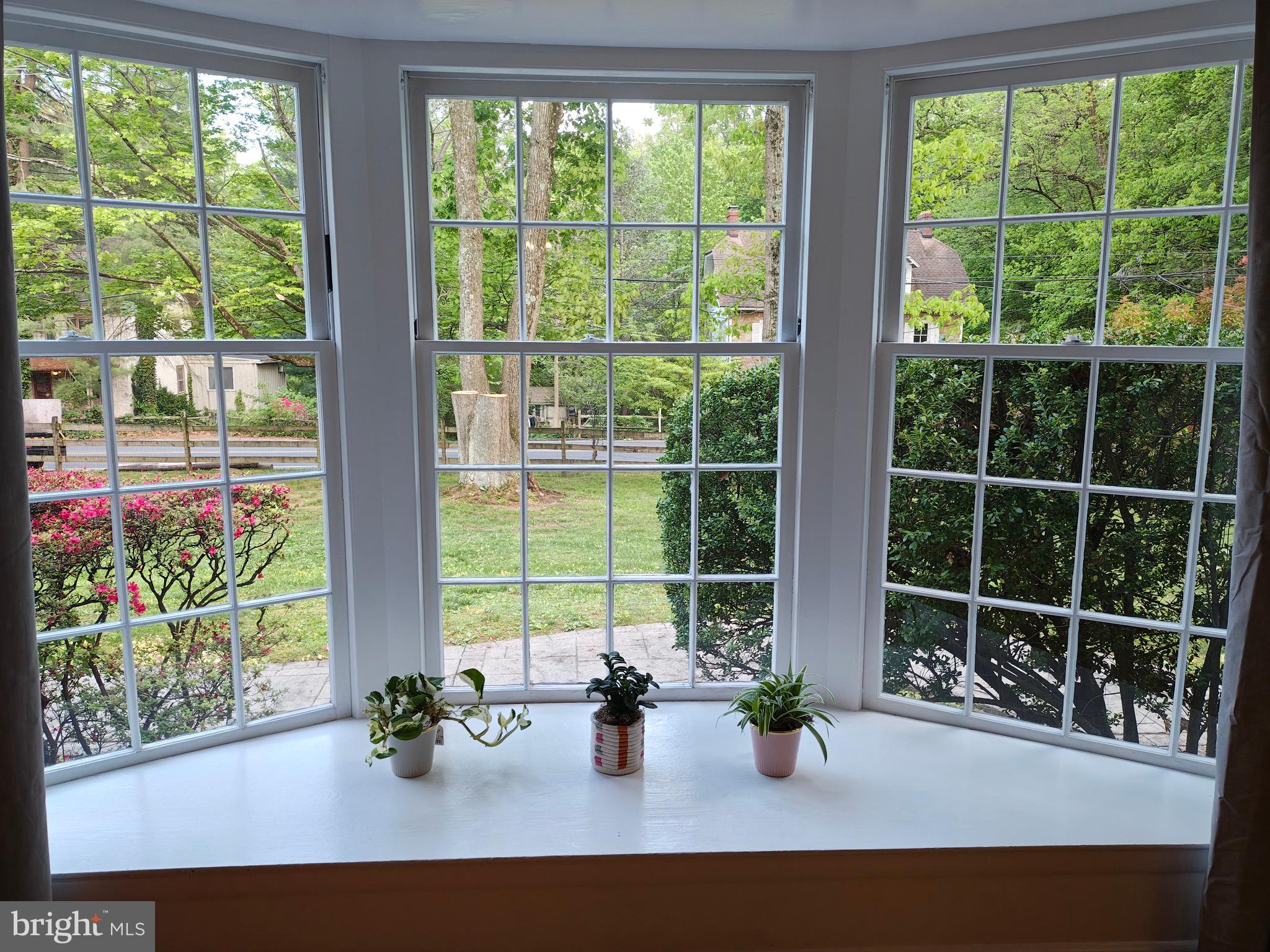 572 Cricket Lane Wayne, PA 19087 - Photo 16 of 37 a view of empty room with wooden floor and windows