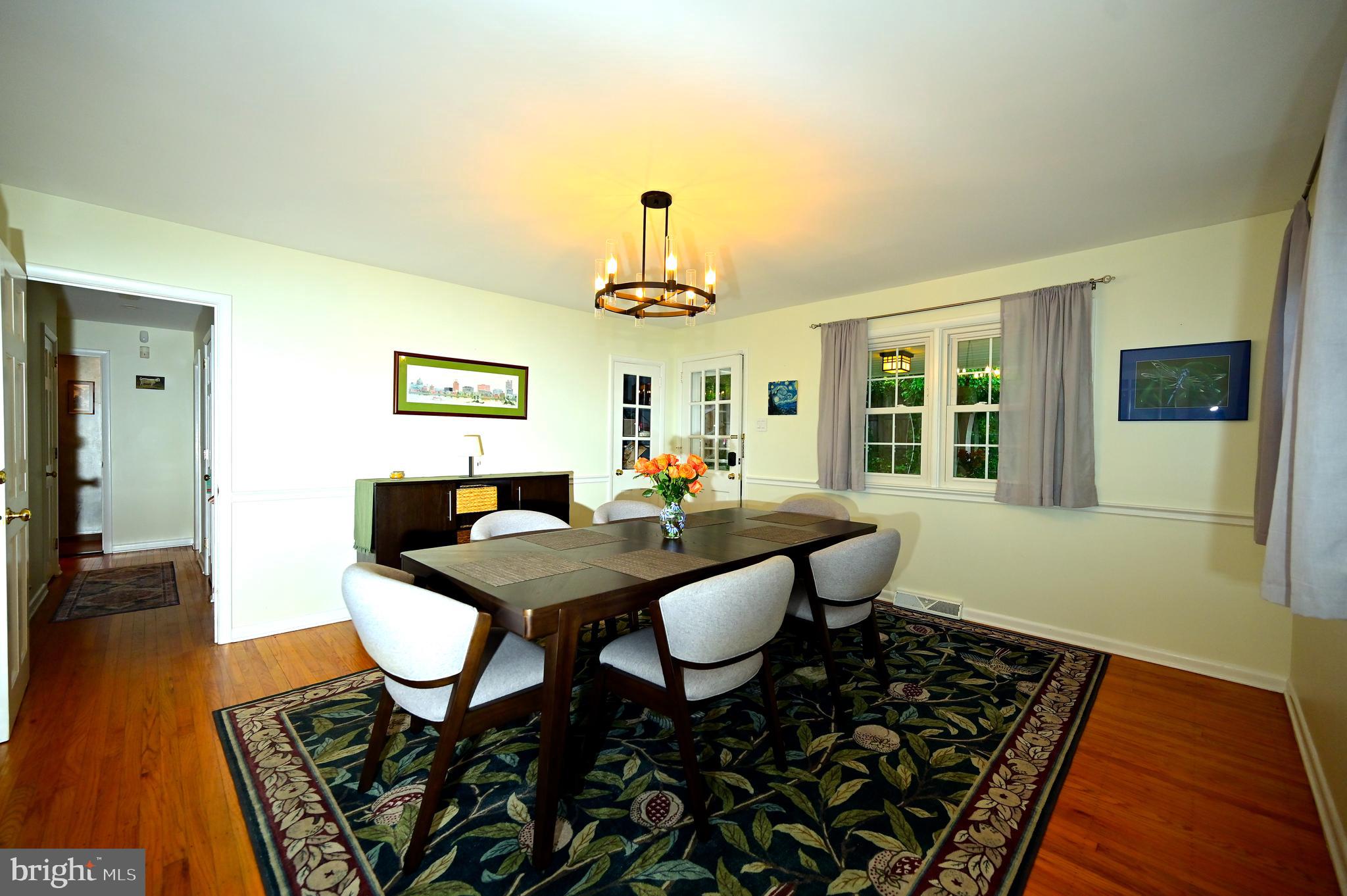 572 Cricket Lane Wayne, PA 19087 - Photo 17 of 37 a view of a dining room with furniture window and wooden floor