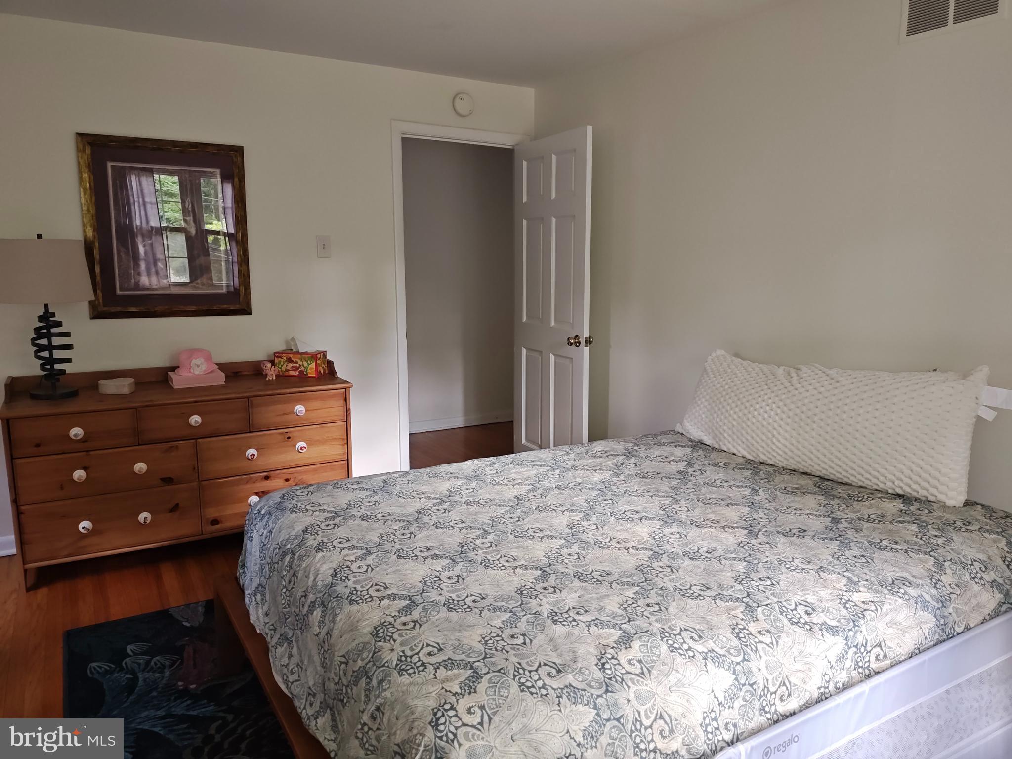 572 Cricket Lane Wayne, PA 19087 - Photo 32 of 37 a bedroom with a bed and a dresser