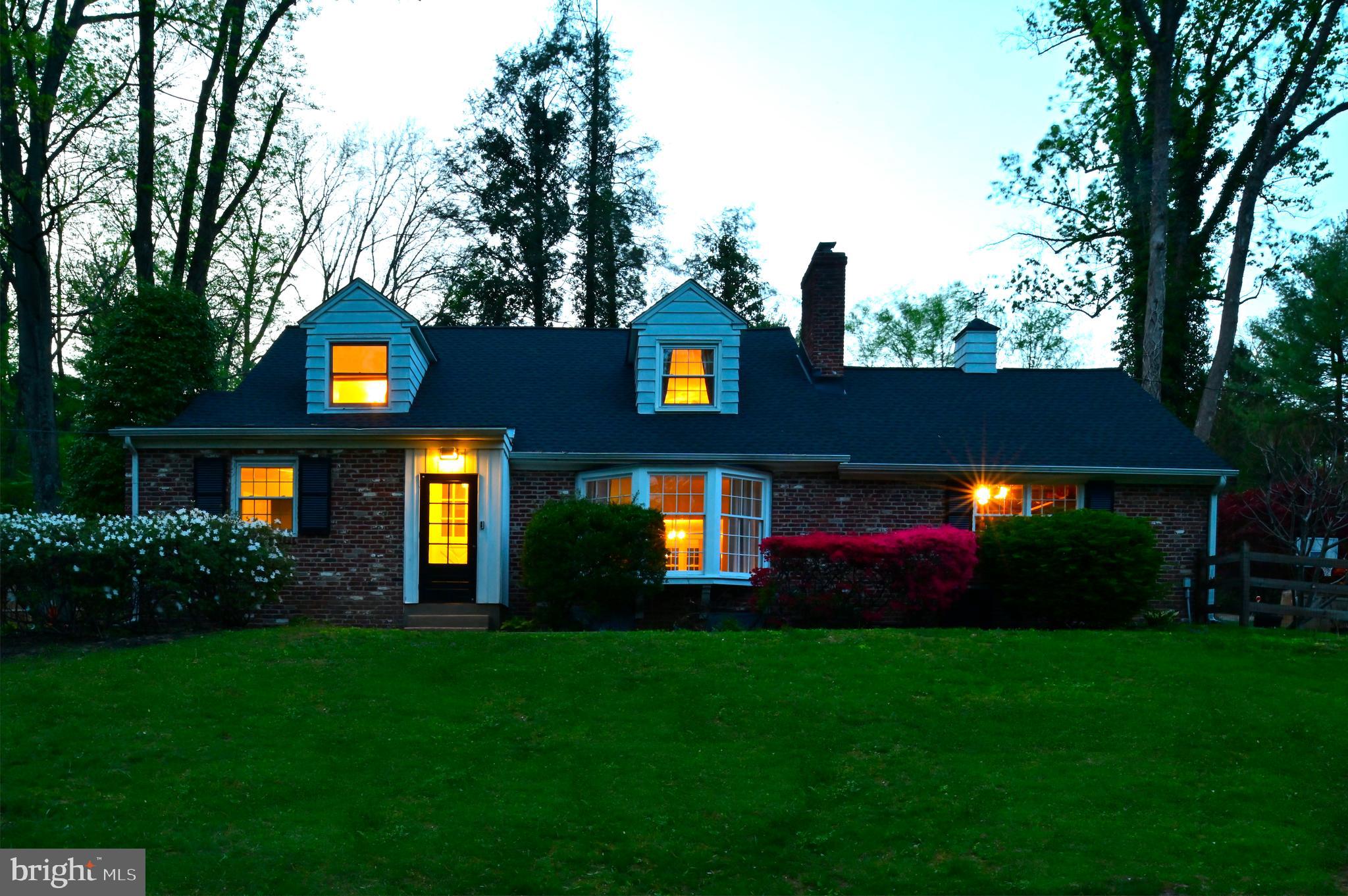 572 Cricket Lane Wayne, PA 19087 - Photo 36 of 37 a front view of a house with a garden