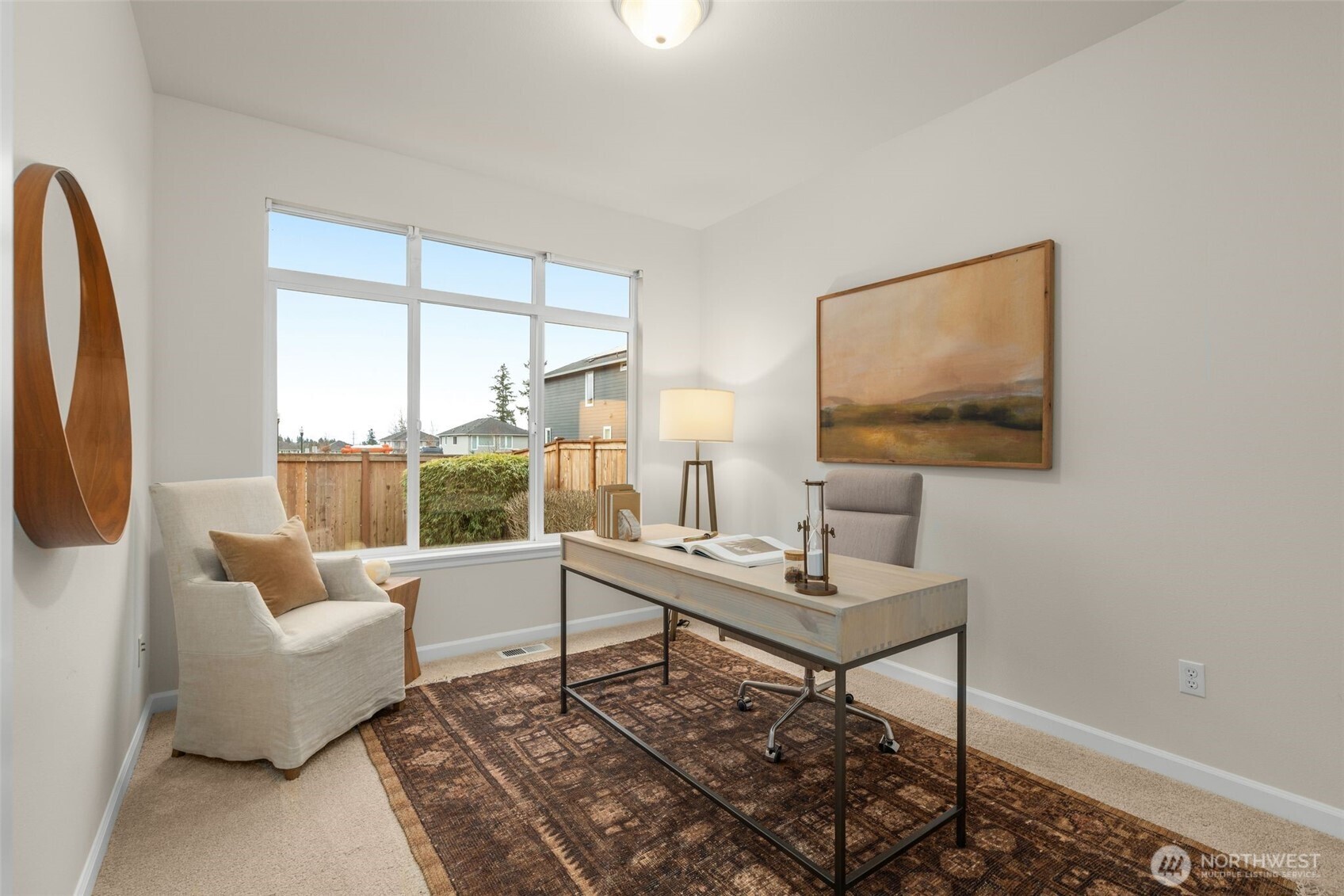 16101 Southeast 251st Street Covington, WA 98042 - Photo 15 of 32 a living room with furniture and a window