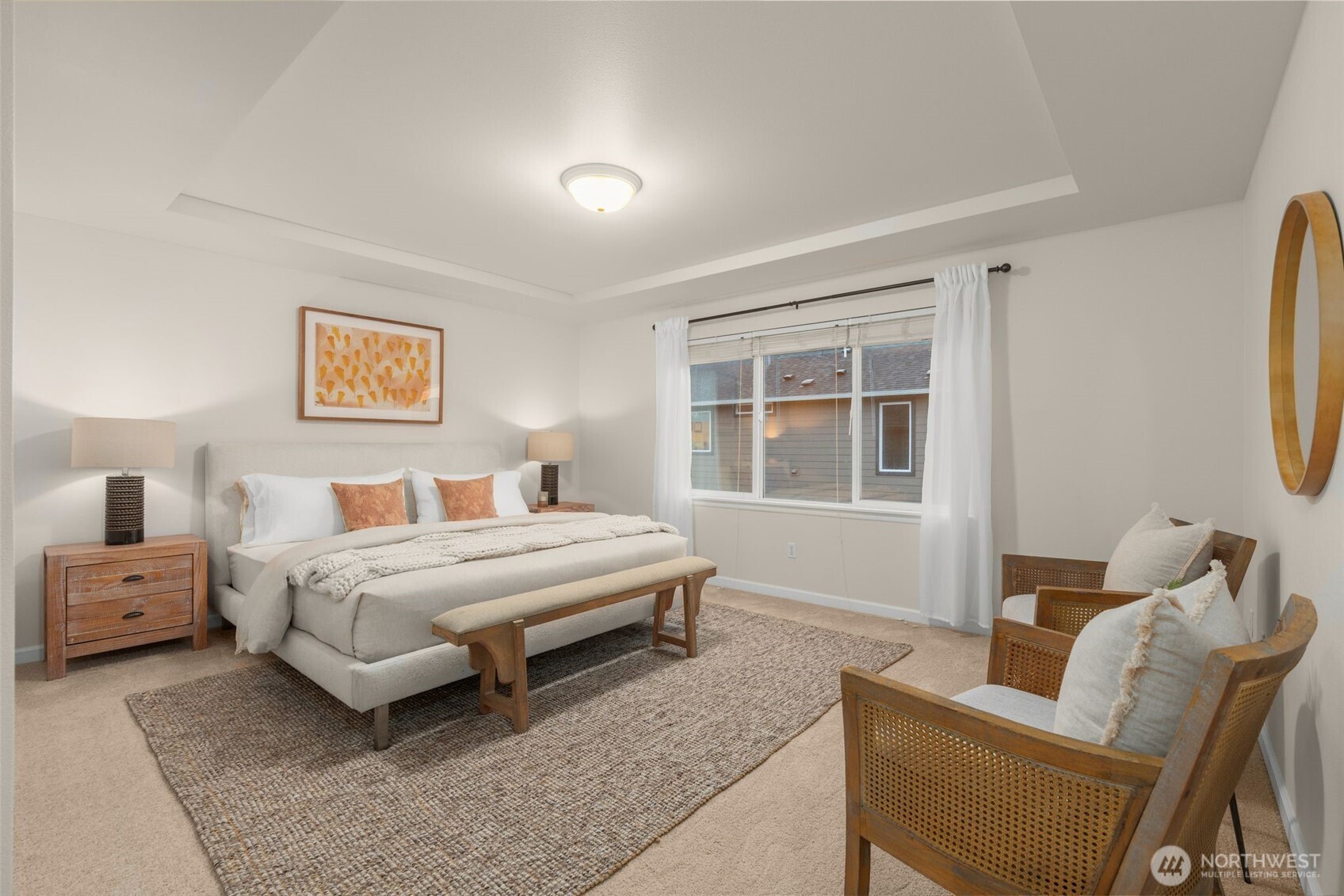16101 Southeast 251st Street Covington, WA 98042 - Photo 19 of 32 a spacious bedroom with a bed and wooden floor