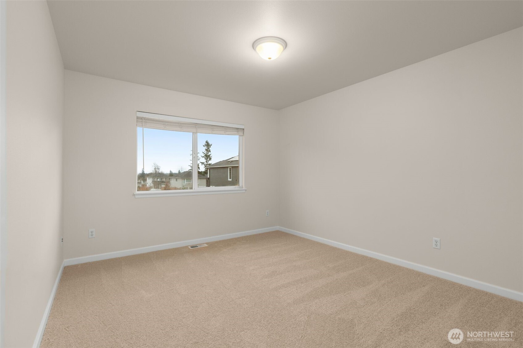 16101 Southeast 251st Street Covington, WA 98042 - Photo 25 of 32 an empty room with a window