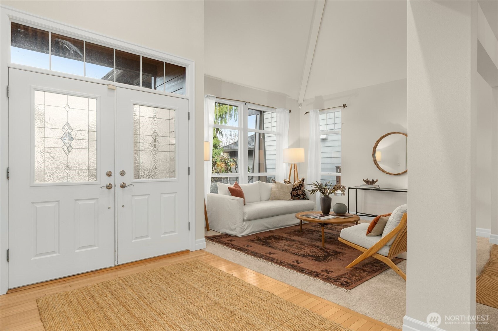 16101 Southeast 251st Street Covington, WA 98042 - Photo 3 of 32 a living room with furniture a window and a table