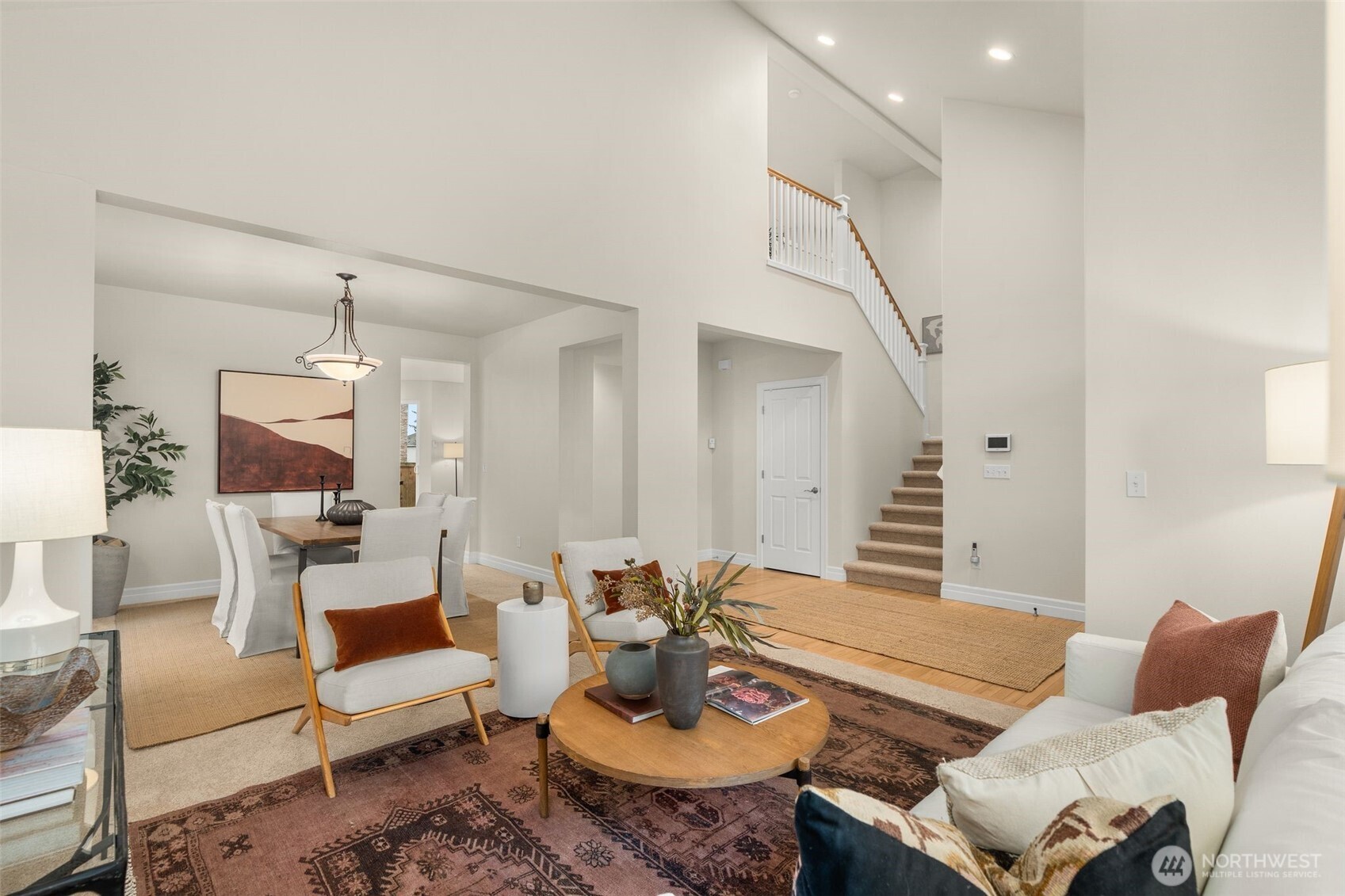 16101 Southeast 251st Street Covington, WA 98042 - Photo 4 of 32 a living room with furniture and wooden floor