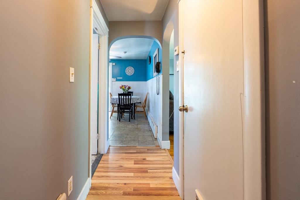 110 James M Beardsworth Road Tiverton, RI 02878 - Photo 7 of 26 a view of a hallway to a livingroom and a hallway