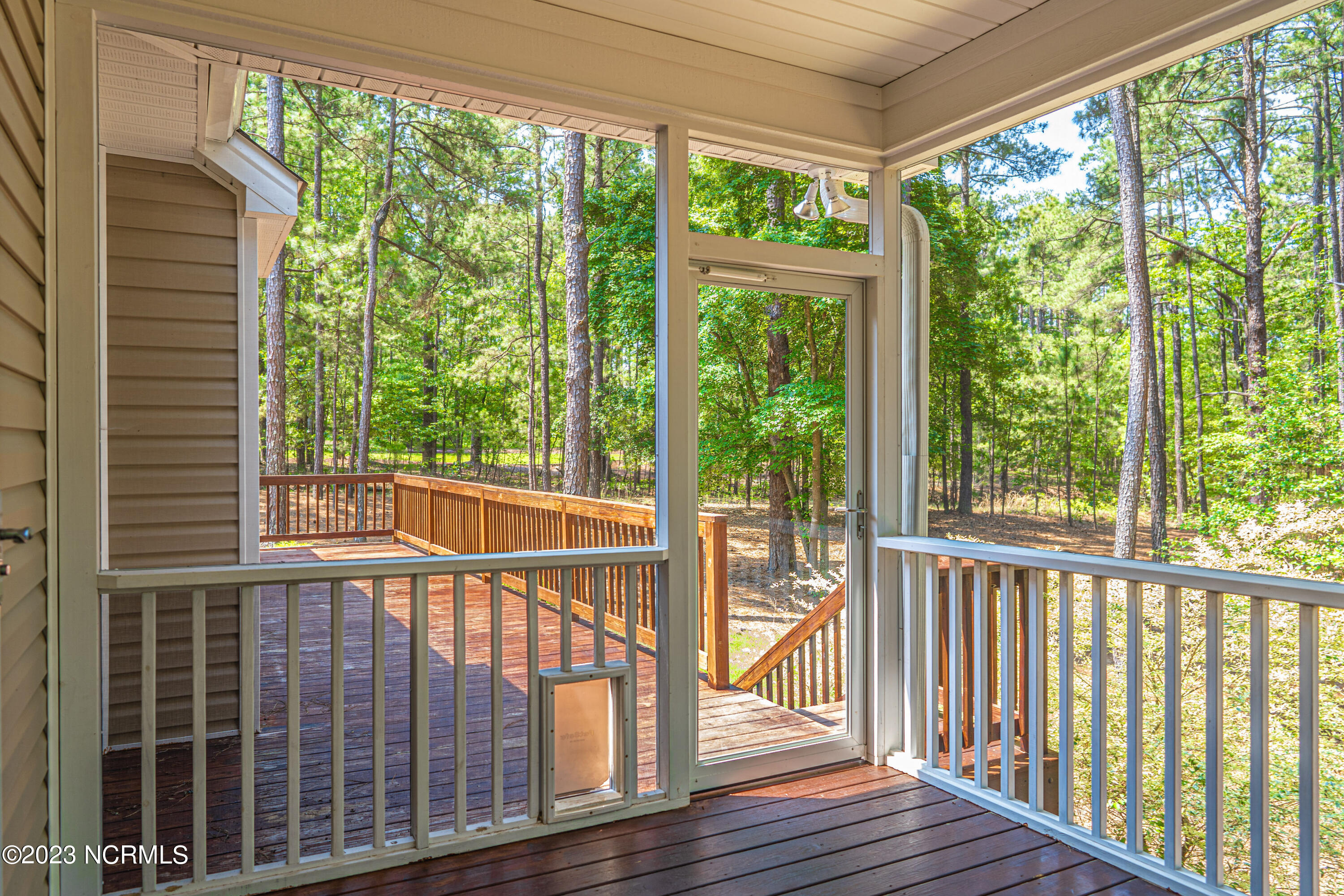 547 Longleaf Drive West End, NC 27376 - Photo 47 of 62 Back Screened Porch