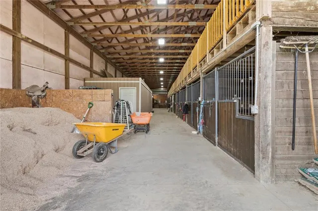 a kitchen with stainless steel appliances a stove a sink and a refrigerator