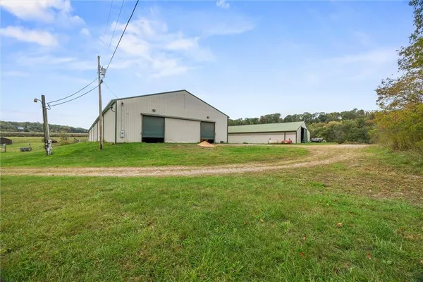 a view of a lake with houses in the back