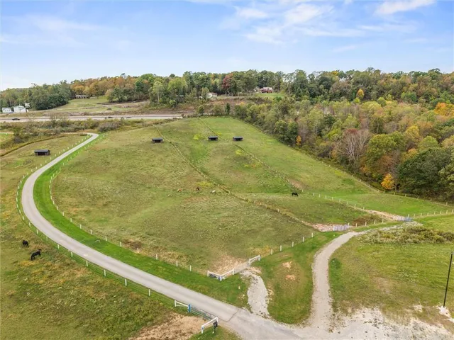 a view of swimming pool with a yard