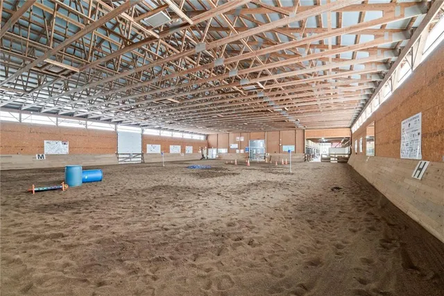 a view of a room with wooden roof