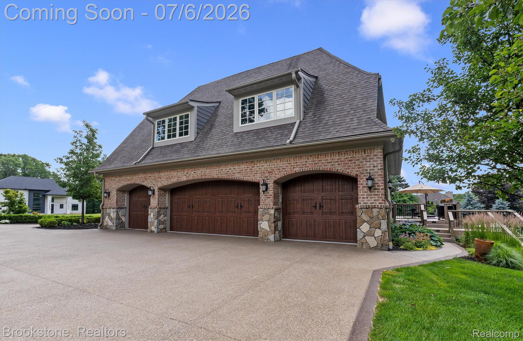 5458 Boulderwood Ridge Clarkston, MI 48348 - Photo 50 of 52 23x45 4 car garage with wide exposed aggregate driveway
