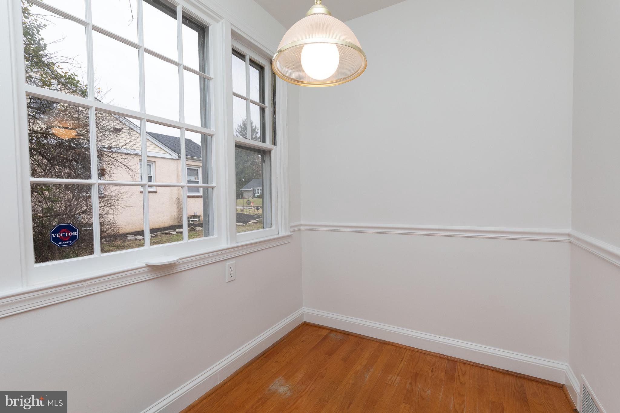615 Arlingham Road Flourtown, PA 19031 - Photo 11 of 25 a view of a room with rack on the wall and a window