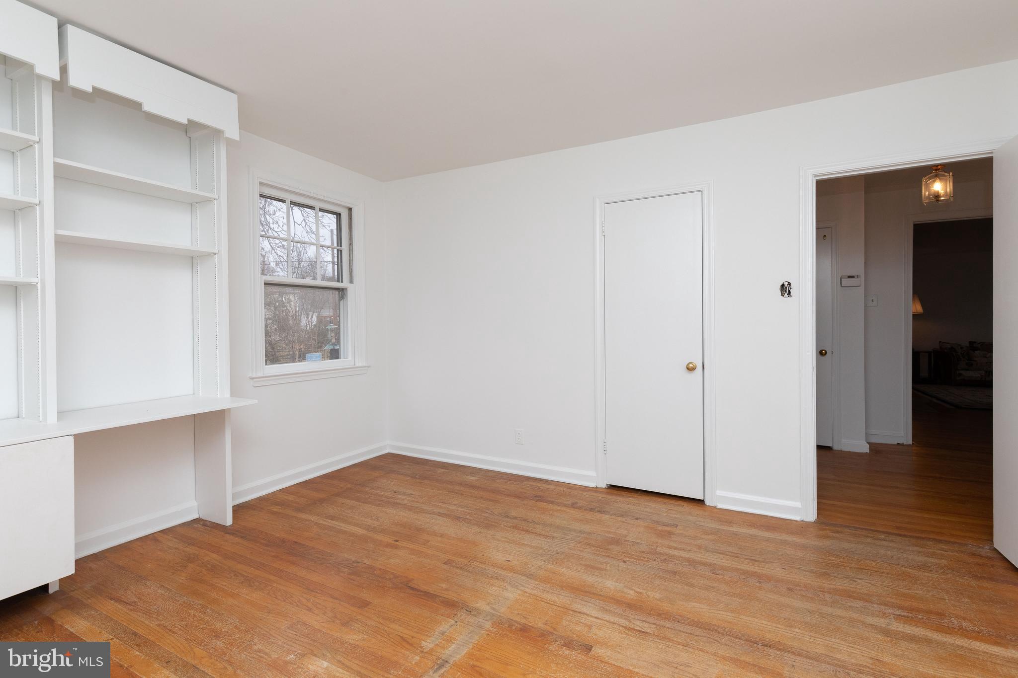 615 Arlingham Road Flourtown, PA 19031 - Photo 14 of 25 a view of empty room with wooden floor and fan