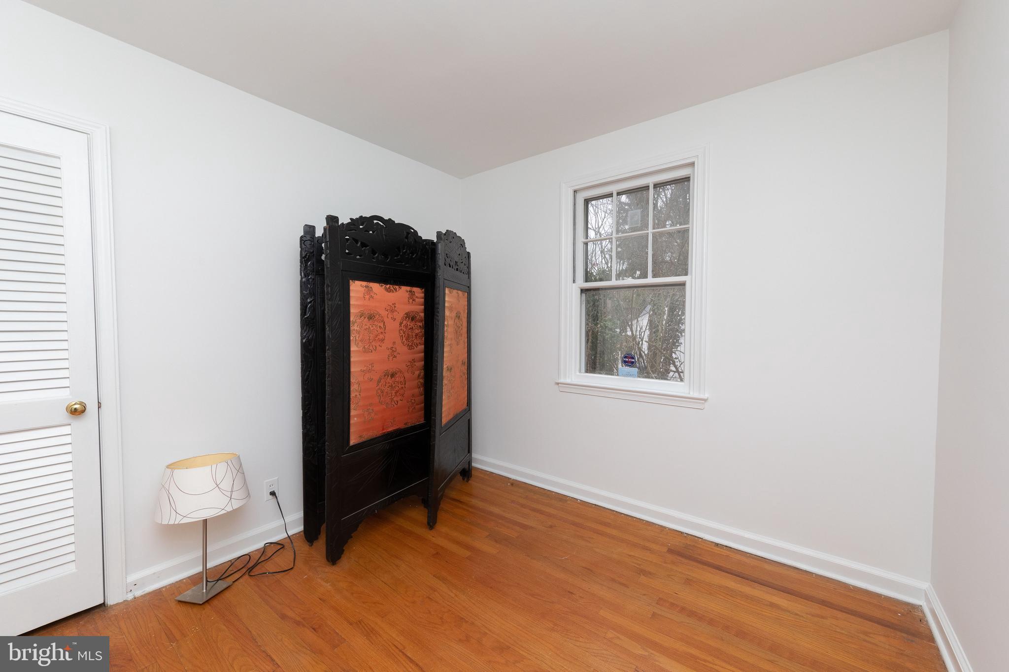 615 Arlingham Road Flourtown, PA 19031 - Photo 15 of 25 a view of an empty room and window