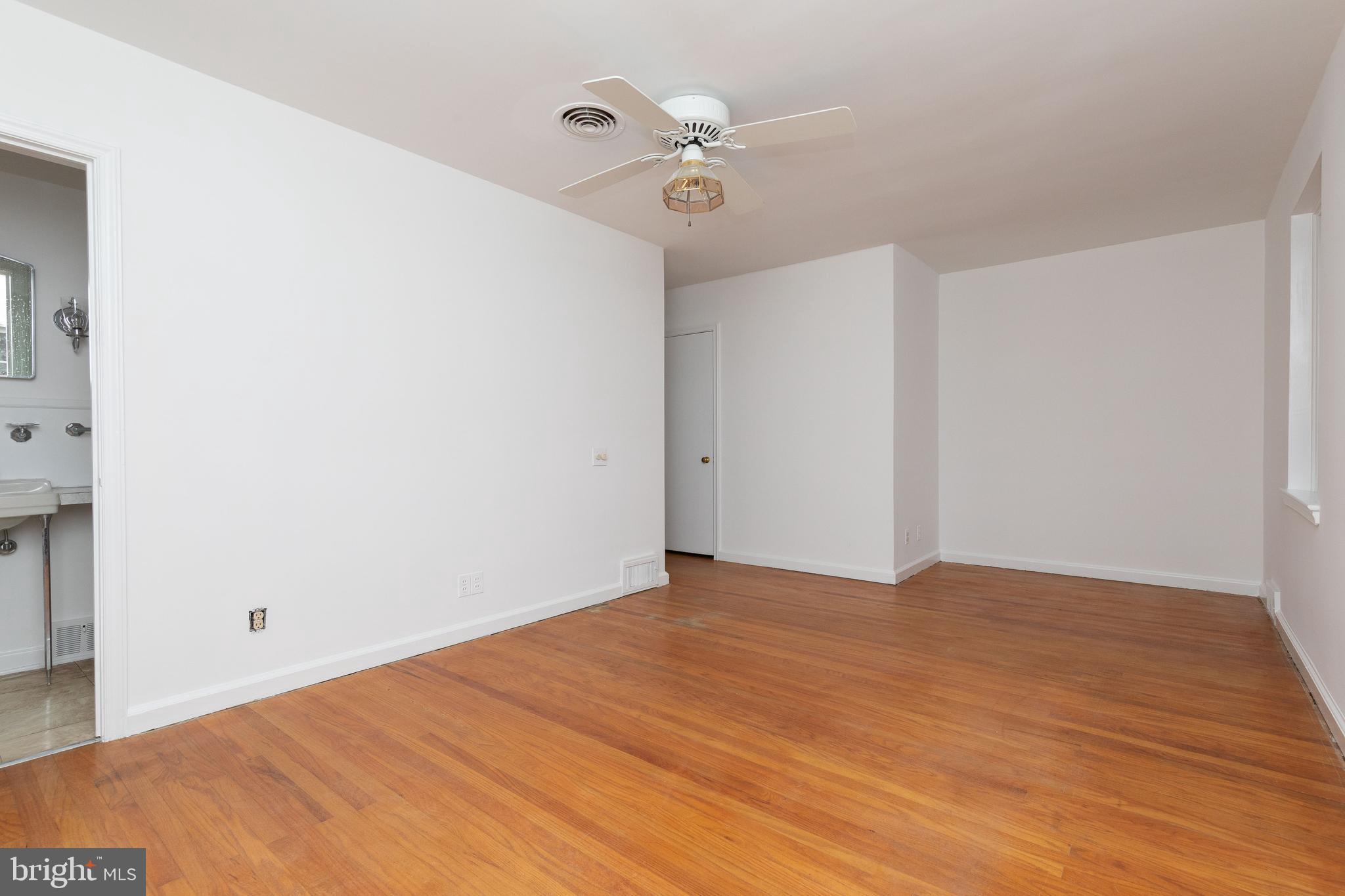 615 Arlingham Road Flourtown, PA 19031 - Photo 18 of 25 a view of an empty room with a ceiling fan
