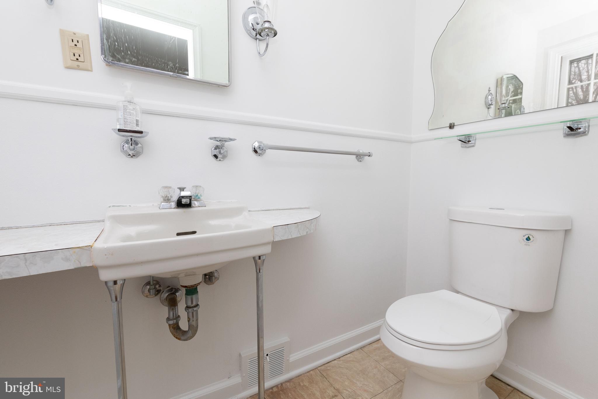 615 Arlingham Road Flourtown, PA 19031 - Photo 19 of 25 a bathroom with a sink and toilet
