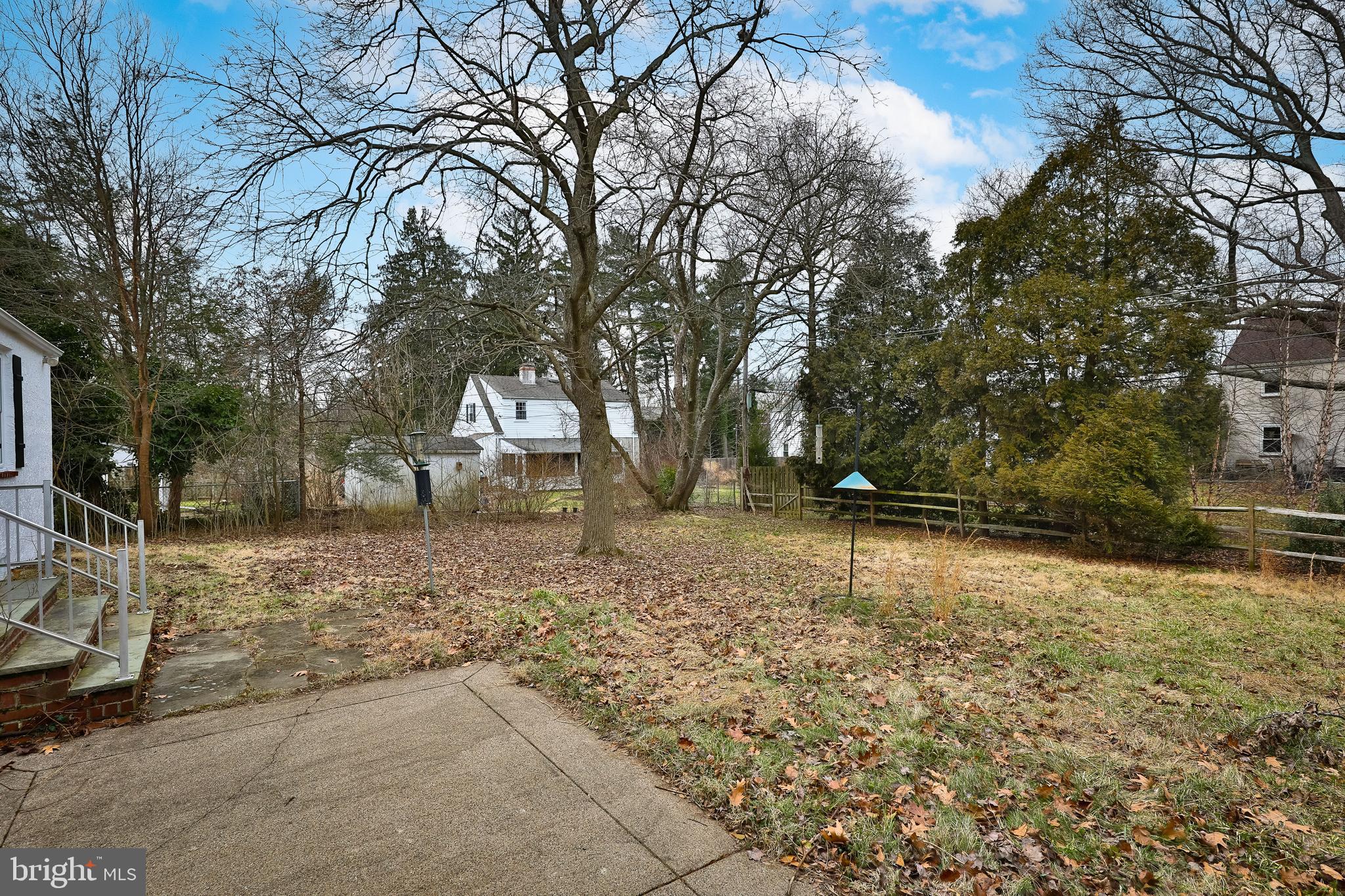 615 Arlingham Road Flourtown, PA 19031 - Photo 23 of 25 a view of a yard with plants and trees