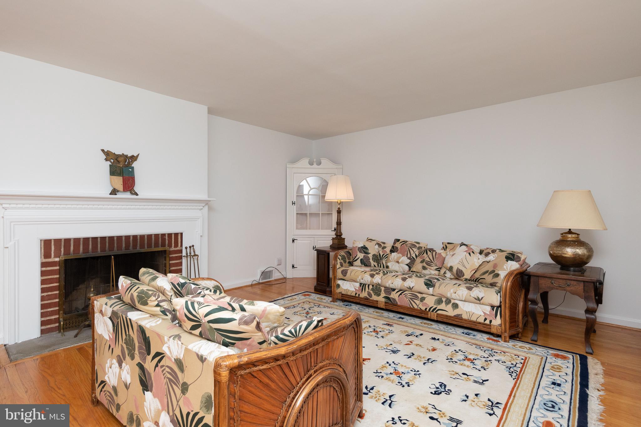 615 Arlingham Road Flourtown, PA 19031 - Photo 3 of 25 a bed sitting in a bedroom next to a fireplace