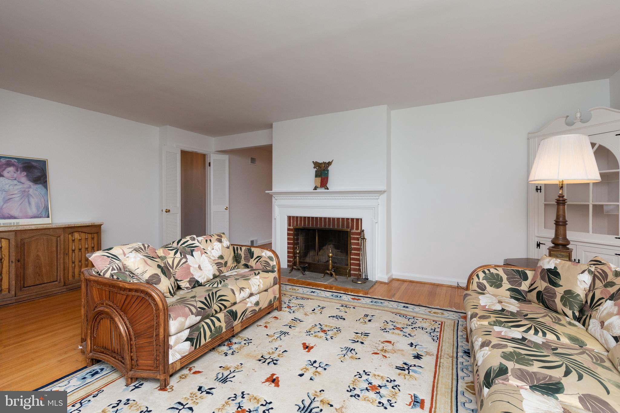 615 Arlingham Road Flourtown, PA 19031 - Photo 4 of 25 a bed room with a bed and a fireplace