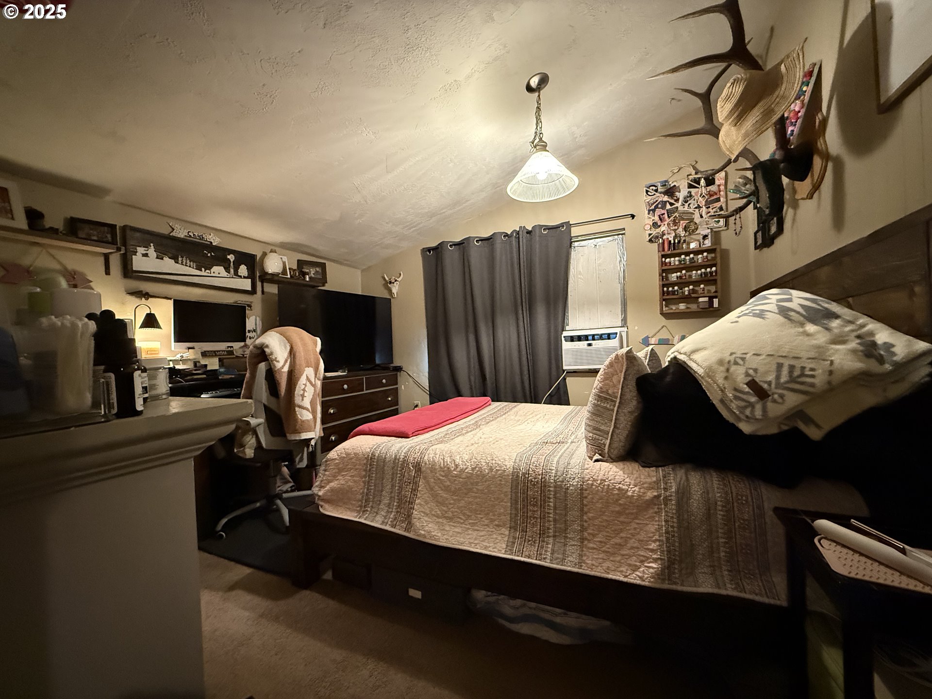 77220 Bar B L Ranch Road Oakridge, OR 97463 - Photo 14 of 24 a bedroom with bed and window