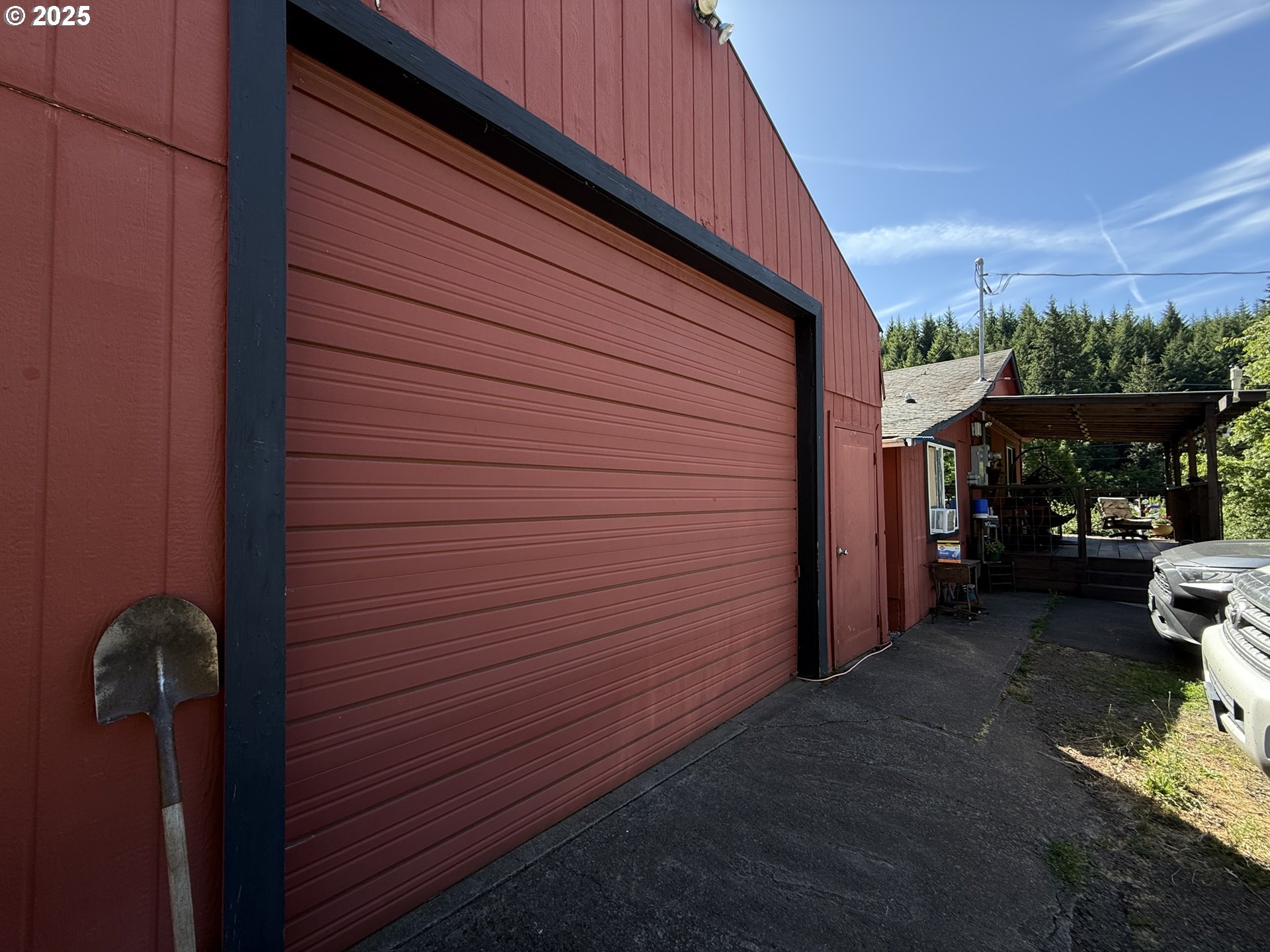 77220 Bar B L Ranch Road Oakridge, OR 97463 - Photo 19 of 24 a view of a door and chair in the balcony