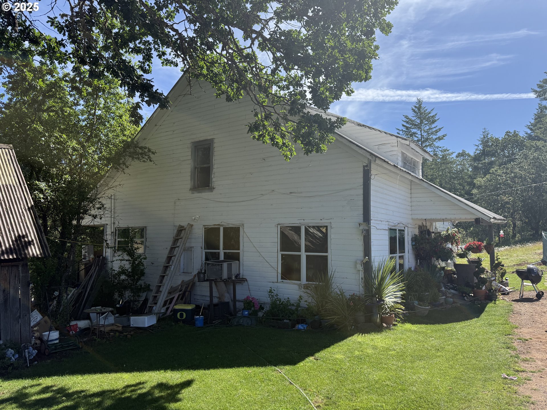 77220 Bar B L Ranch Road Oakridge, OR 97463 - Photo 22 of 24 front view of house with a yard