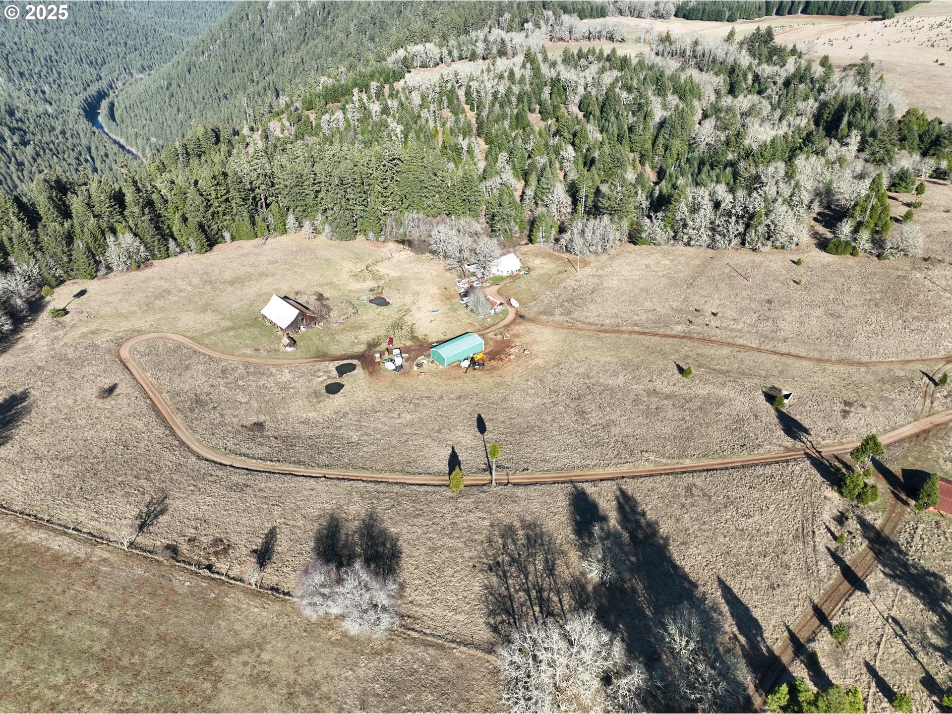 77220 Bar B L Ranch Road Oakridge, OR 97463 - Photo 4 of 24 a view of a wooden floor