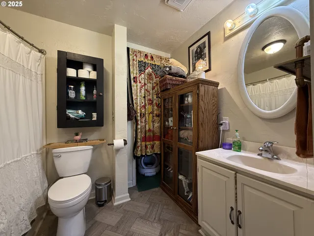 a utility room with closet dryer and washer