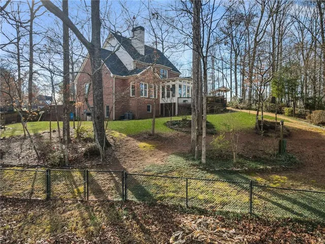 $825,000 | 1505 Runnymede Drive Southwest, Lilburn, GA 30047