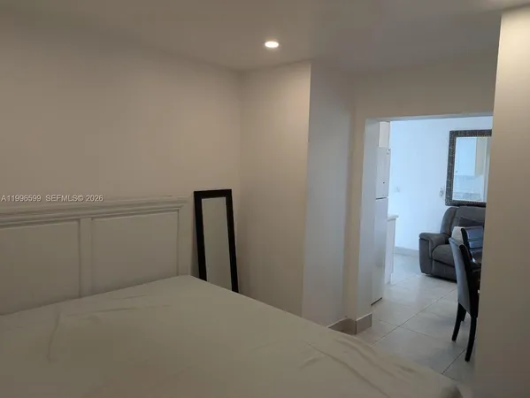 a bedroom with a bed