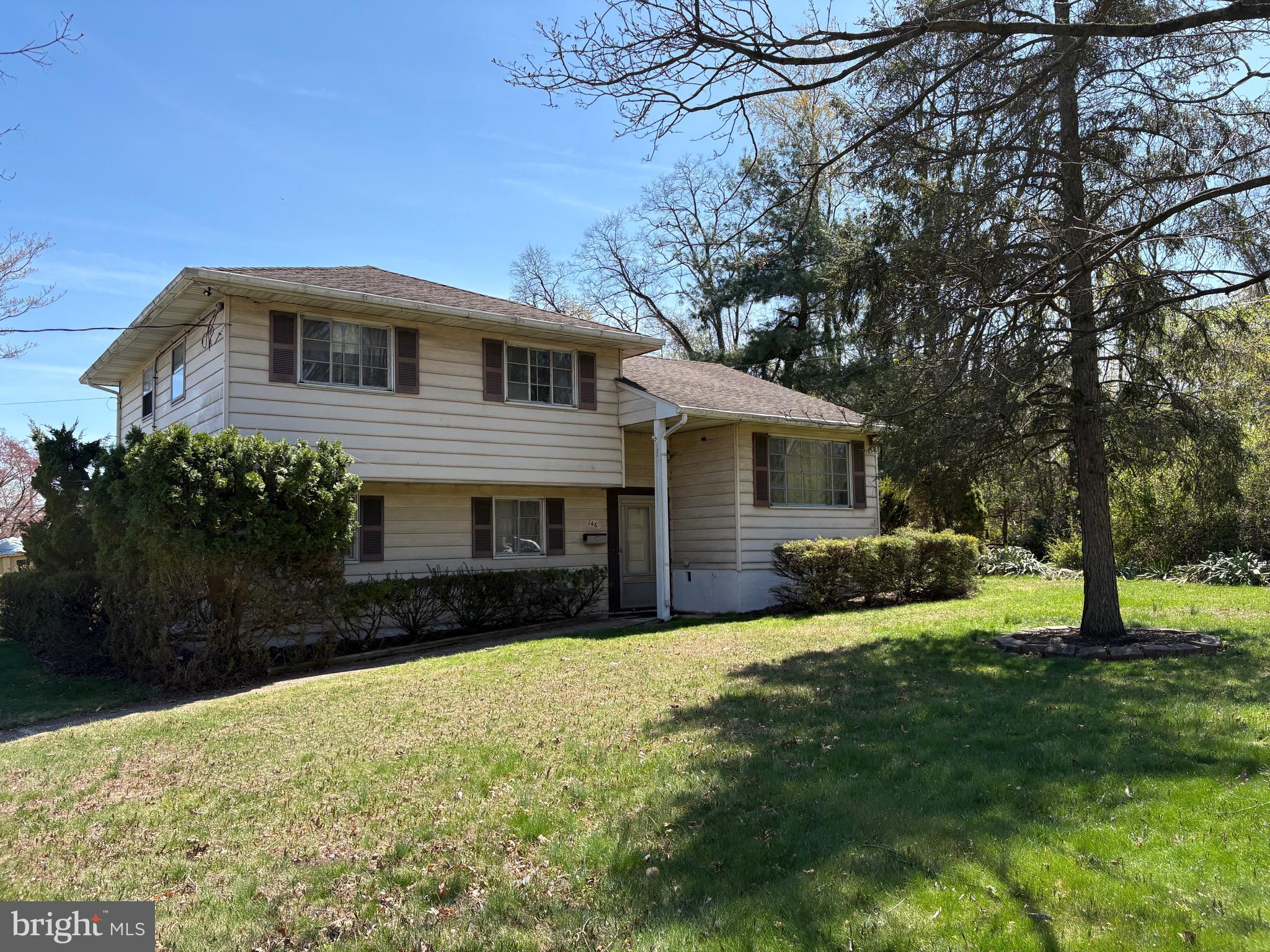 146 Ewingville Road Ewing, NJ 08638 - Photo 1 of 7 a front view of house with yard and green space