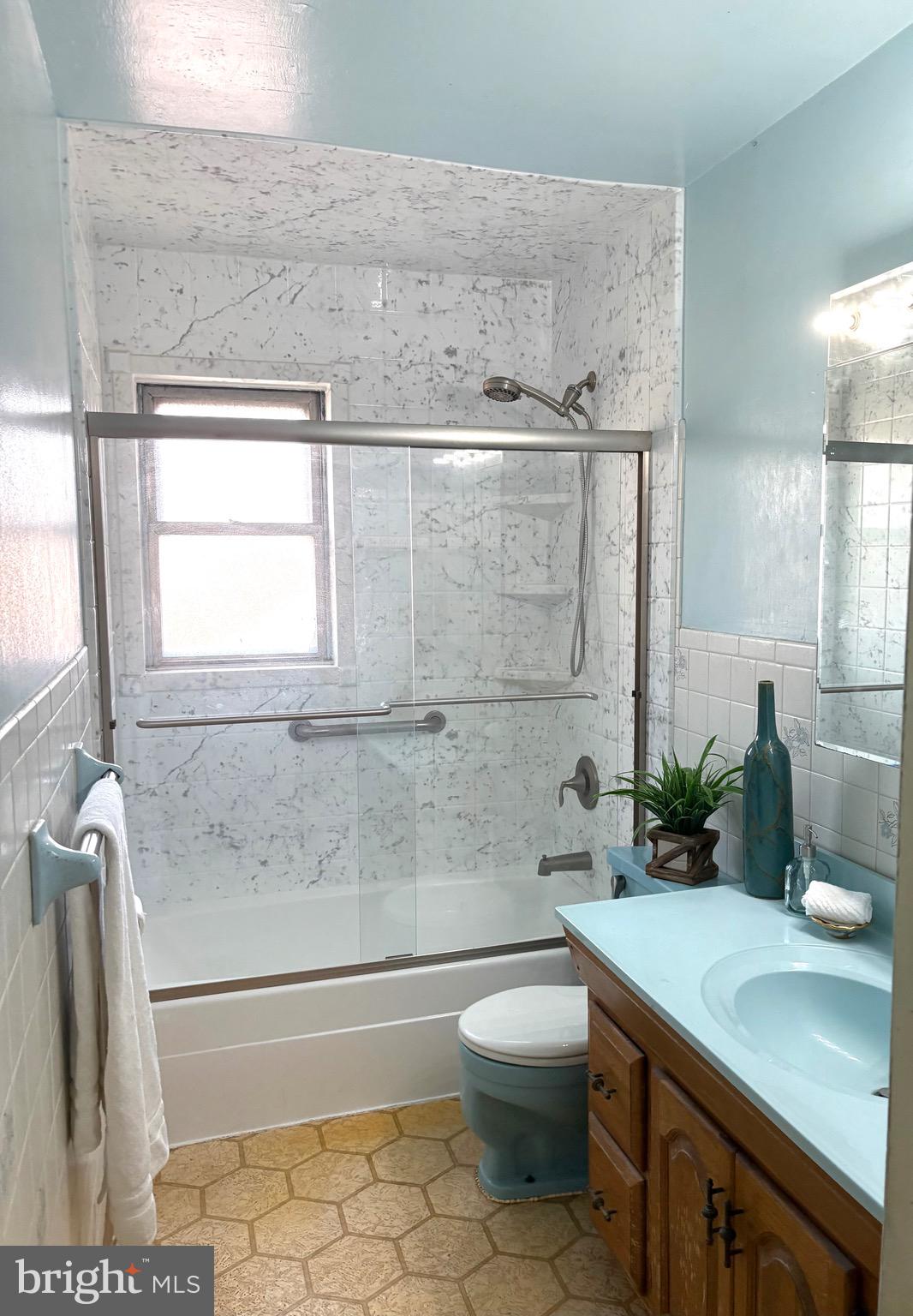 146 Ewingville Road Ewing, NJ 08638 - Photo 5 of 7 a bathroom with a granite countertop bathtub sink vanity mirror and toilet