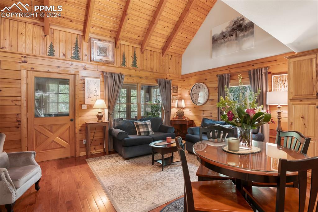143 Wahsatch Road Florissant, CO 80816 - Photo 21 of 50 a view of a dining room with furniture window and wooden floor