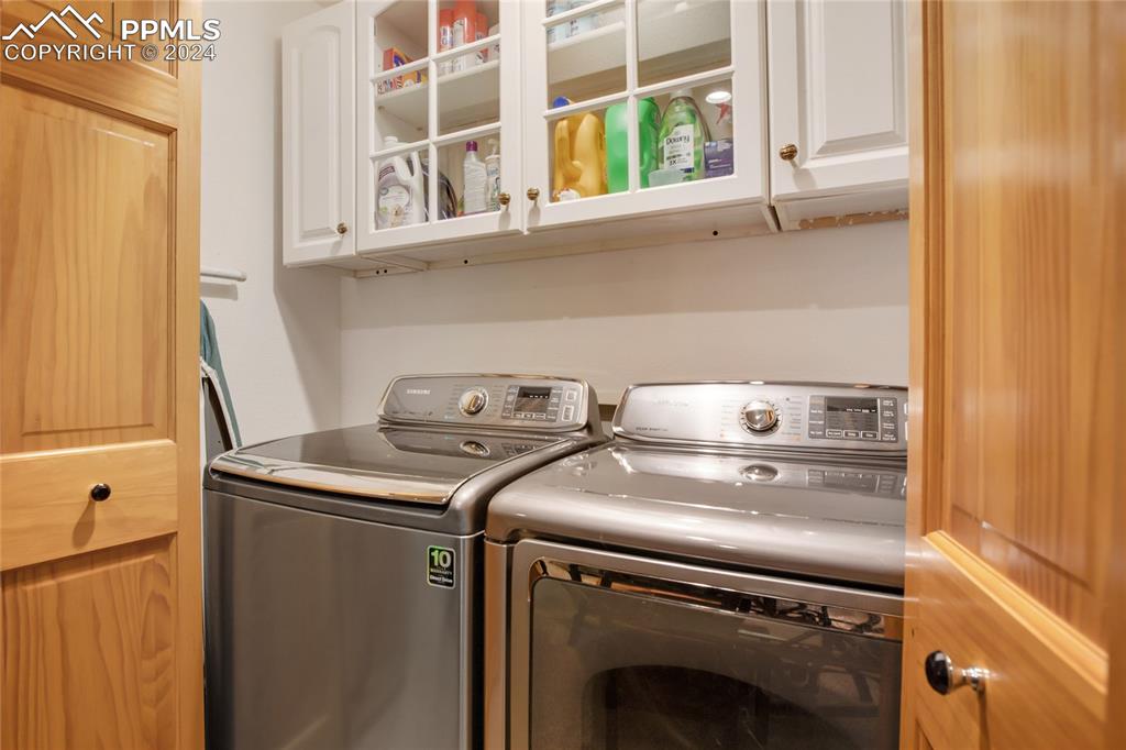 143 Wahsatch Road Florissant, CO 80816 - Photo 42 of 50 a utility room with dryer and washer