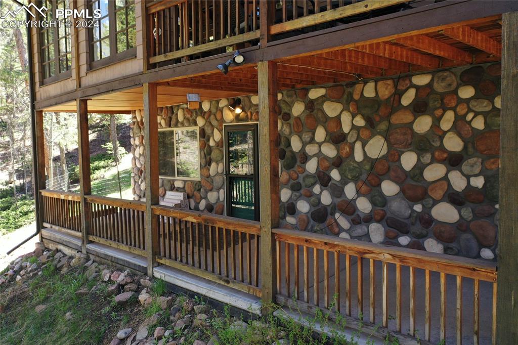 143 Wahsatch Road Florissant, CO 80816 - Photo 47 of 50 a view of a porch with a small yard