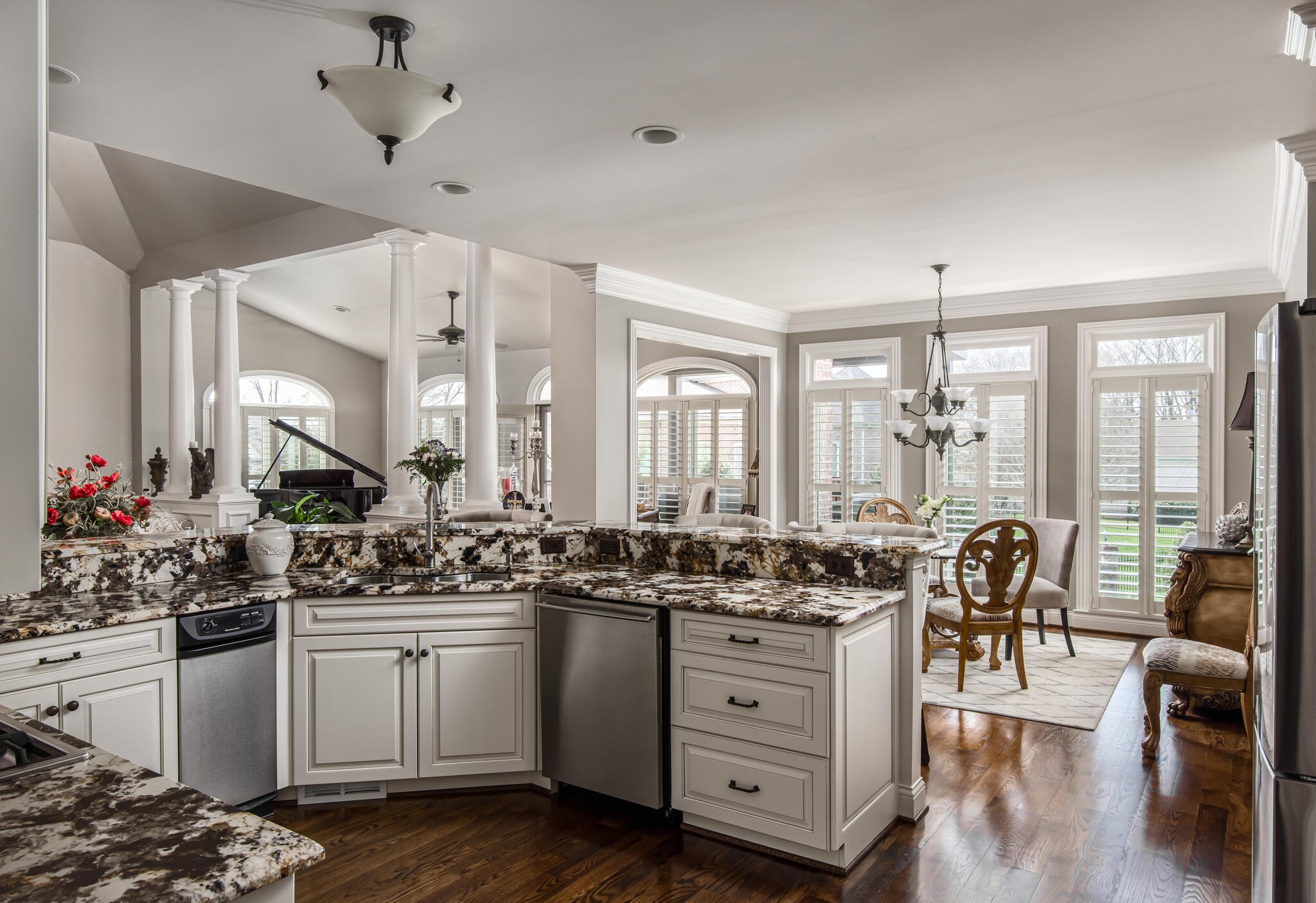 1101 Sunset Road Brentwood, TN 37027 - Photo 14 of 40 a kitchen with stainless steel appliances kitchen island granite countertop a sink and cabinets