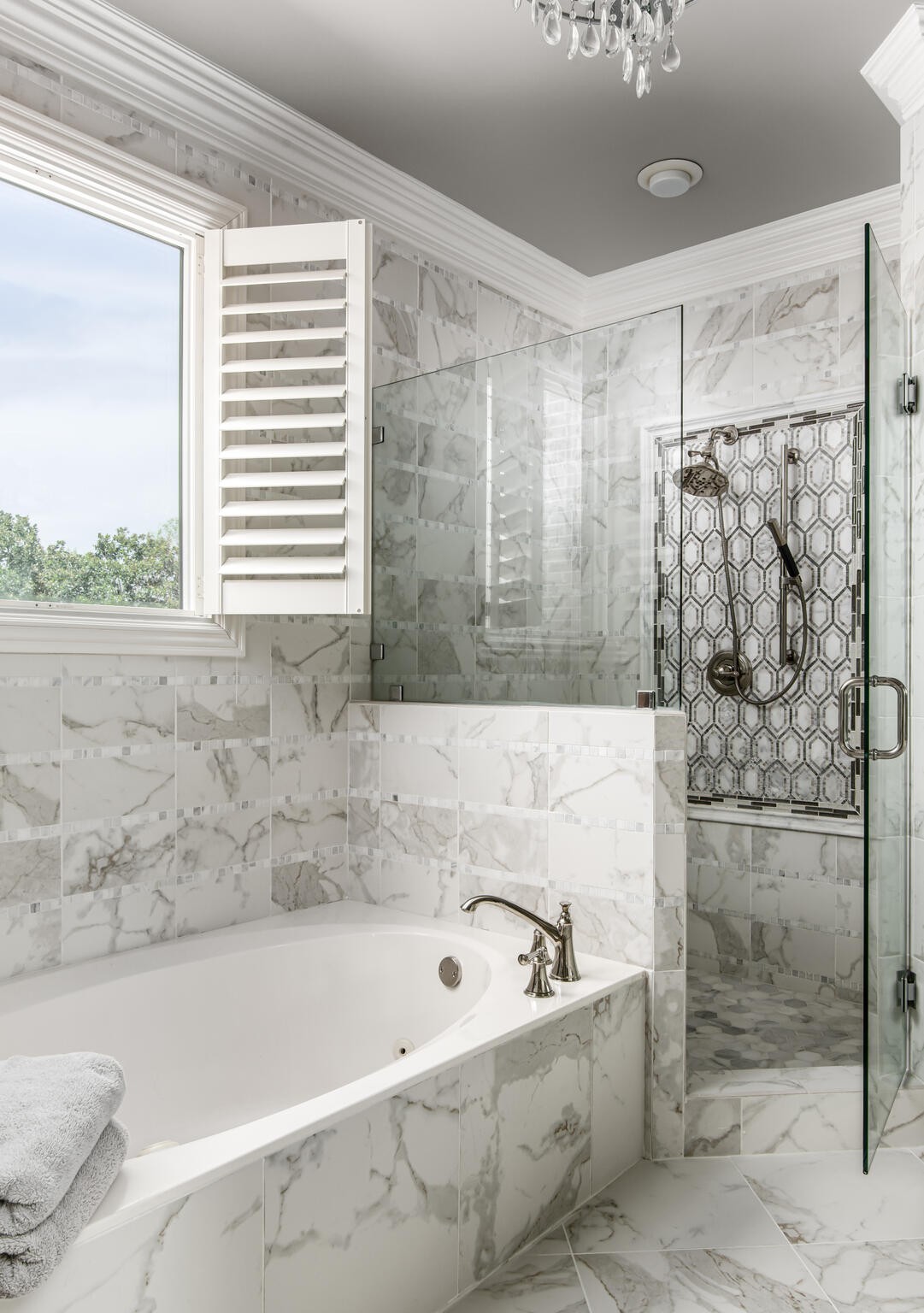 1101 Sunset Road Brentwood, TN 37027 - Photo 24 of 40 a bathroom with a bathtub and a shower