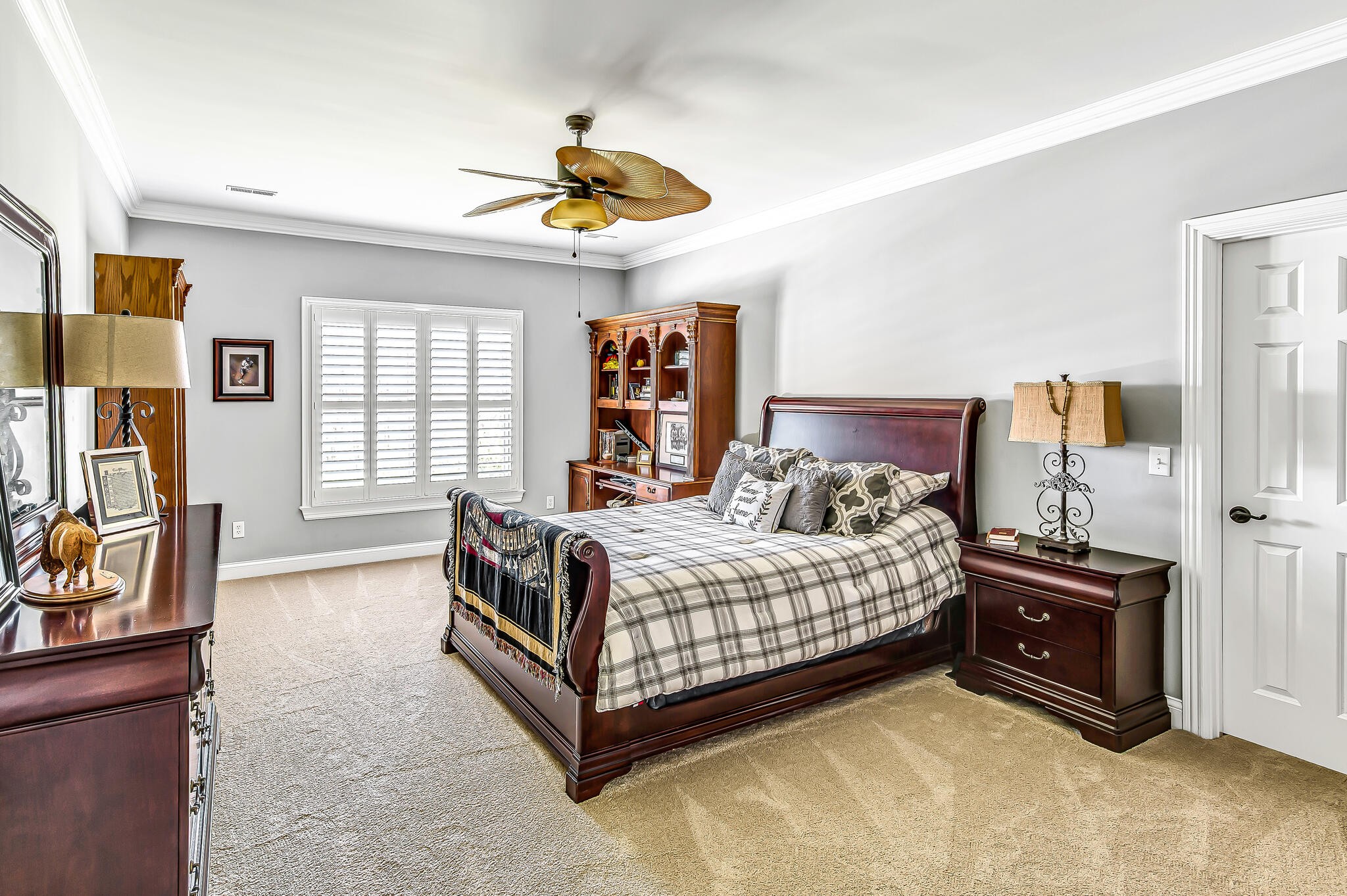 1101 Sunset Road Brentwood, TN 37027 - Photo 30 of 40 a bedroom with a bed and a chandelier