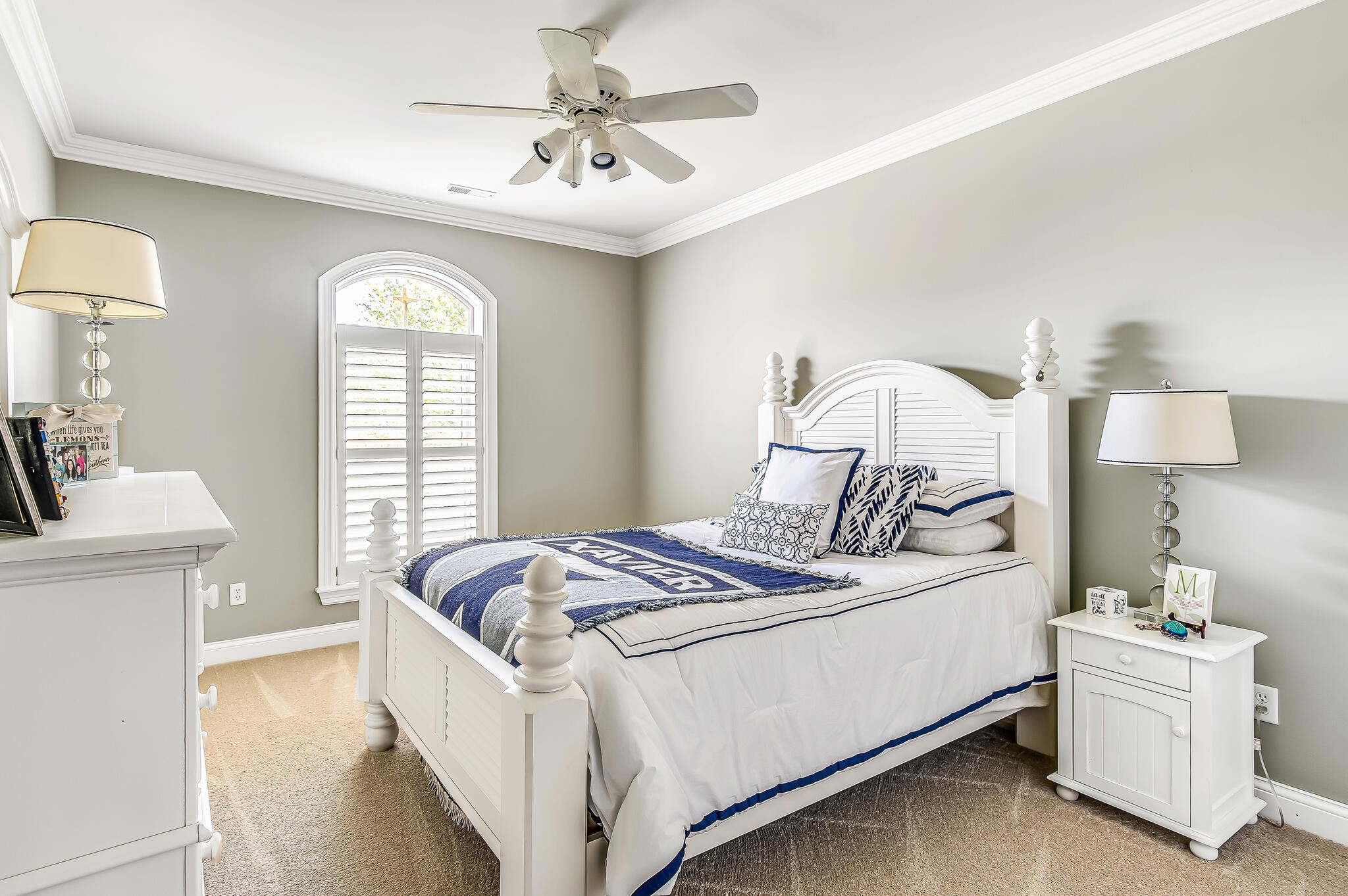 1101 Sunset Road Brentwood, TN 37027 - Photo 32 of 40 a bedroom with a bed and a chandelier