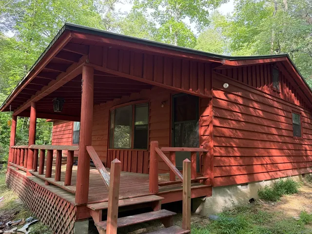 a view of outdoor space with deck and backyard