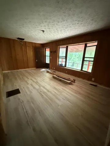 an empty room with windows