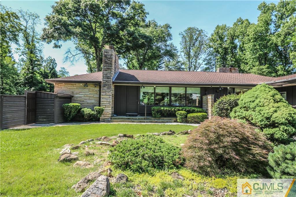 45 Sherwood Road Colonia, NJ 07067 - Photo 1 of 25 a view of a house with garden and yard
