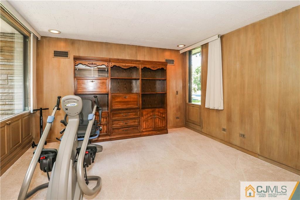 45 Sherwood Road Colonia, NJ 07067 - Photo 7 of 25 a view of an empty room with a window